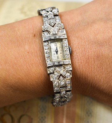 Lot 8 - An Art Deco diamond and platinum cocktail...