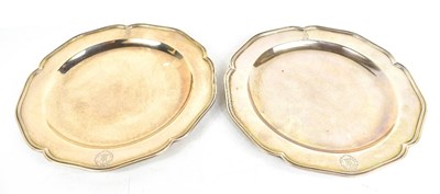 Lot 225 - A pair of George III silver dishes, engraved...