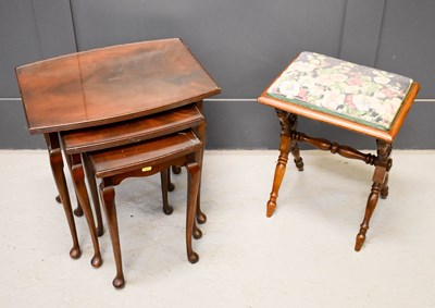 Lot 532 - A mahogany nest of tables 53cm high, together...
