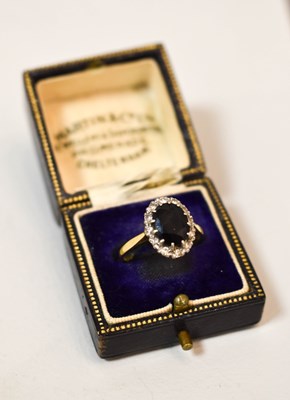 Lot 93 - An 18ct gold, sapphire and diamond ring, the...