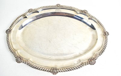 Lot 232 - A George III silver meat dish, moulded oval...