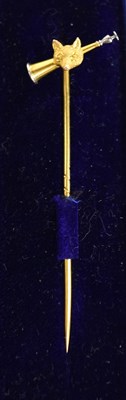 Lot 17 - A gold stock pin in the form of a fox head and...