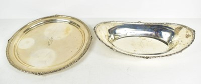 Lot 231 - A silver tray of circular form with gadrooned,...