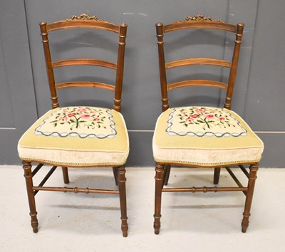 Lot 533 - A pair of French walnut Victorian bedroom...