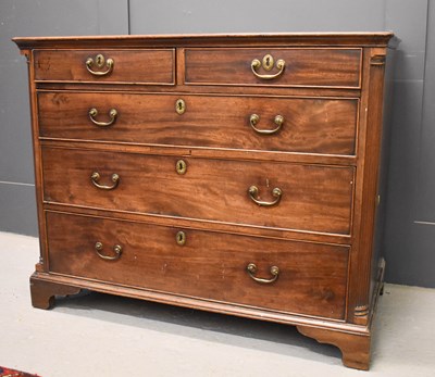 Lot 582 - A Georgian chest of drawers, with two short...