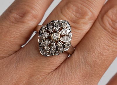 Lot 42 - An 18ct white gold and diamond ring, the...