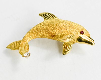 Lot 55 - An 18ct gold, ruby and diamond brooch, with a...