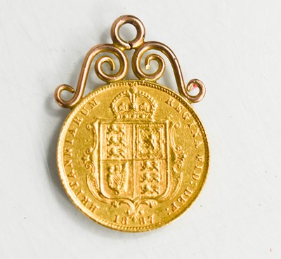 Lot 61 - A Victoria half sovereign, 1887, with a scroll...
