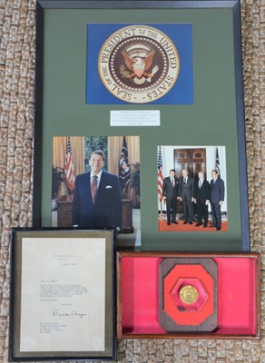 Lot 248a - A framed and glazed collage of USA...