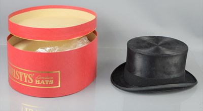 Lot 360A - A 20th century Christy's of London black top...