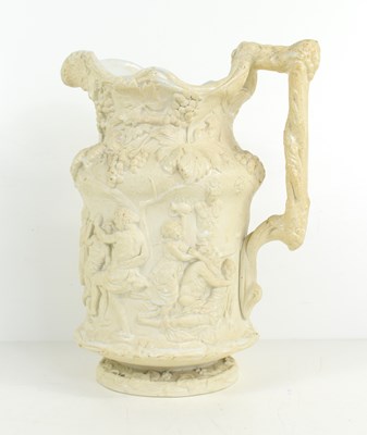 Lot 227 - A Victorian relief moulded white stoneware jug,...
