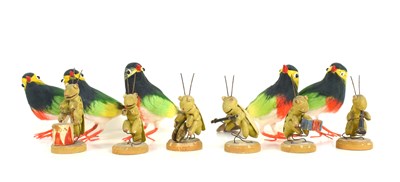 Lot 228 - A group of six miniature wooden grasshopper...