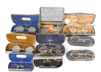 Lot 212 - A collection of antique spectacles to include...