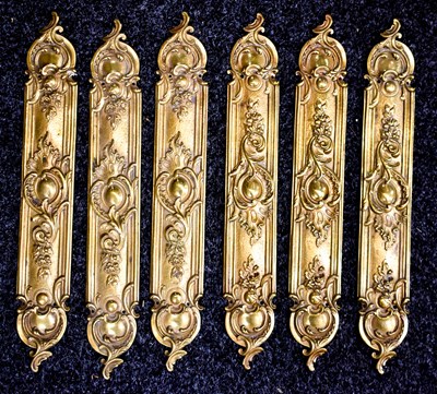 Lot 297 - A set of six French Rococo style brass door...