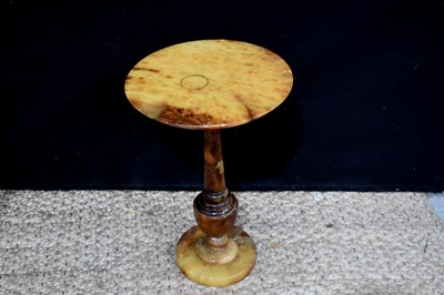 Lot 377 - An antique agate wine table, with circular top,...