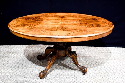 Lot 374 - A Victorian rosewood tea table, with an oval...