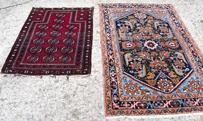Lot 332 - A Middle Eastern wool rug, 200 by 134cm,...