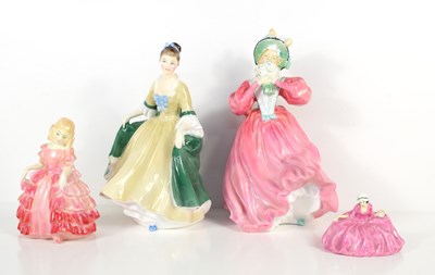 Lot 244 - A group of Royal Doulton porcelain figurines...