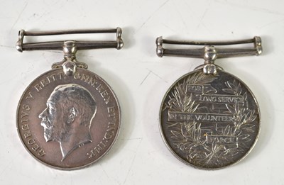 Lot 327 - Two medals awarded to Corporal A.J Stiff of...