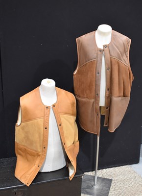 Lot 138 - Two vintage leather and sheepskin gilets, one...