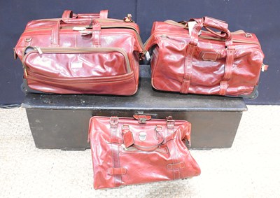 Lot 163 - Three Italian cognac coloured leather luggage...