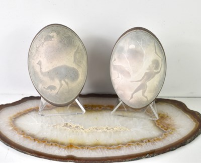 Lot 152 - A pair of carved emu eggs, one depicting two...