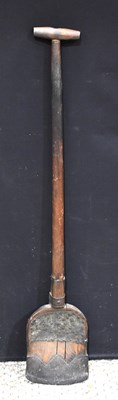 Lot 413 - An antique wooden shovel with wrought iron...