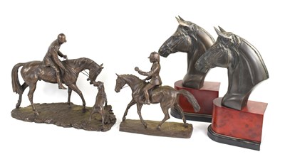 Lot 134 - A pair of bronzed horse head bookends together...