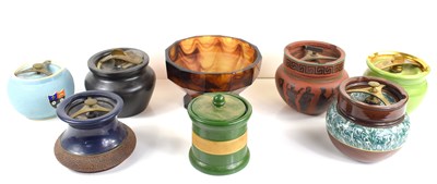 Lot 135 - A group of seven ceramic tobacco jars of...