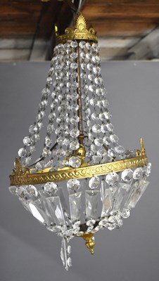 Lot 320 - An early 20th century Empire style chandelier...