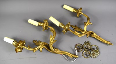 Lot 318 - A pair of French gilt bronze wall sconces in...