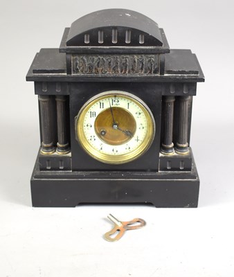 Lot 314 - A 19th century slate mantle clock, Arabic...