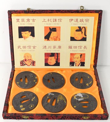 Lot 116 - A group of six Japanese tsubas featuring...