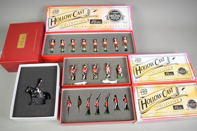 Lot 29 - A group of four boxed W. Britain toy soldier...