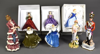 Lot 256 - A group of porcelain figurine to include Royal...