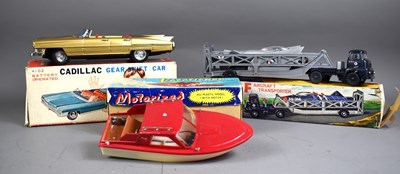 Lot 11 - A group of vintage boxed toys comprising a...