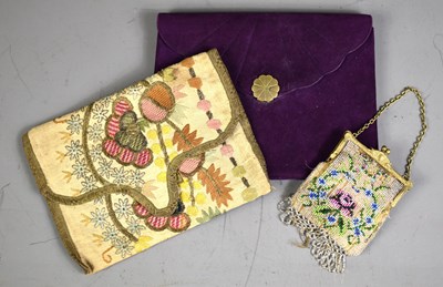 Lot 148 - A vintage evening bag embroidered with flowers...