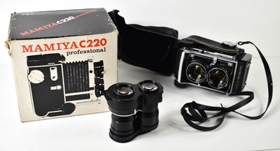 Lot 407 - A Mamiya C220 TLR camera with 105mm with...