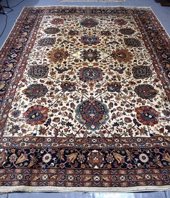 Lot 409 - A large Lansdowne Wilton Persian rug, red and...