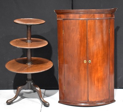 Lot 435 - A George III plum pudding mahogany bow front...