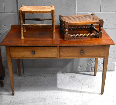 Lot 400 - An early 20th century mahogany desk with two...