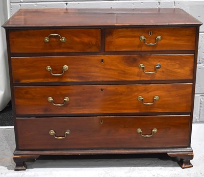 Lot 439 - A Georgian mahogany chest of two of three...