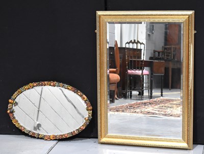 Lot 402 - A 20th century gilt wood wall mirror, 104cm by...