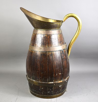 Lot 204 - A large Victorian coopered oak cider jug with...