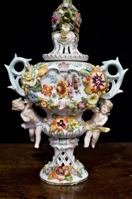Lot 274 - A German porcelain pot pourri vase, in the...