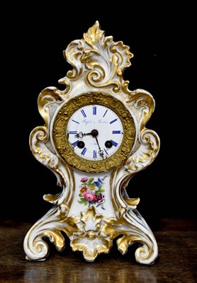 Lot 275 - A Stiffel & Cartier of Paris porcelain mantle...