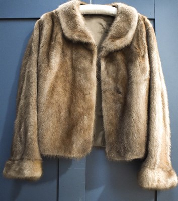 Lot 144 - A vintage musquash mid length jacket, with...