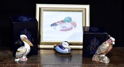 Lot 279 - Three Royal Crown Derby porcelain paperweights:...