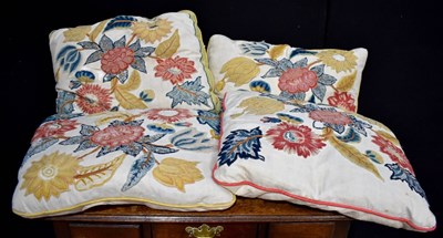Lot 145 - Four crewel-work and linen cushions depicting...