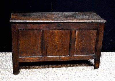 Lot 432 - An 18th century oak coffer, single plank lid,...